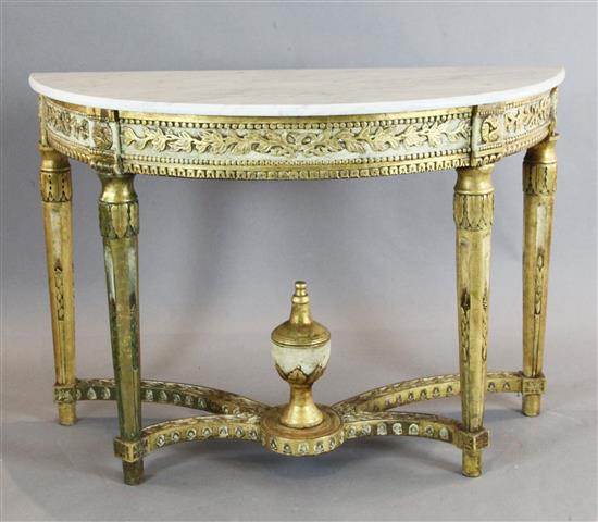 A Regence style D shaped marble topped cream and gilt console table